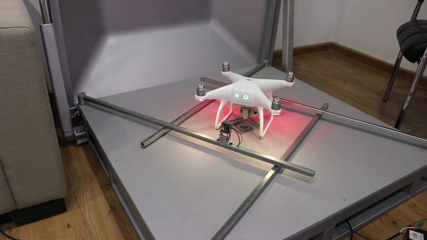 Automatic drone release mechanism inside a smart docking station