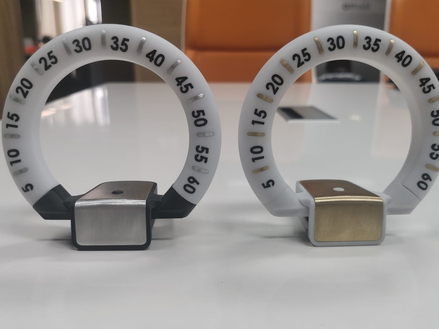 Two finished indicator units in two different finishes