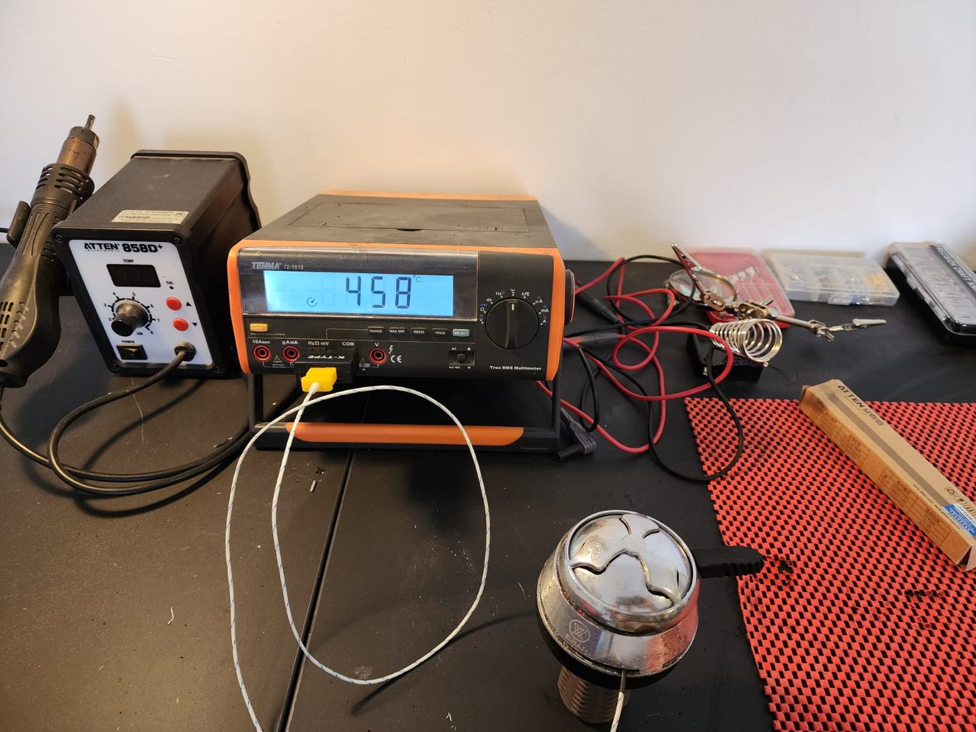 Measuring charcoal temperature in the lab — about 458 degrees Celsius at the surface