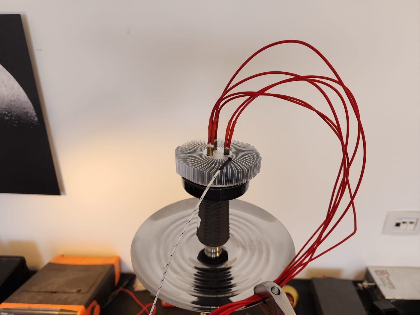 Prototype of the electric heating element mounted on a hookah head in the lab